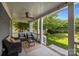Inviting back porch featuring comfortable seating perfect for relaxing and enjoying the outdoors at 15628 Waterfront Dr, Huntersville, NC 28078