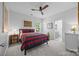 Spacious bedroom with a plush bed, neutral carpet, and a view to the bathroom at 15628 Waterfront Dr, Huntersville, NC 28078