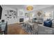 Cozy living room with built-in cabinets, stylish furnishings, and ample natural light at 15628 Waterfront Dr, Huntersville, NC 28078