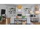 Bright and airy living room with built-in bookshelves, stylish decor, and modern lighting at 15628 Waterfront Dr, Huntersville, NC 28078