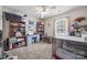 Bedroom with a large window for natural light, desk, bookcase and neutral carpet at 1668 Tate Rd, Rock Hill, SC 29732