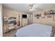 Bedroom view features comfortable carpet, unique decor, and door to the bathroom at 1668 Tate Rd, Rock Hill, SC 29732