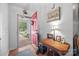 Bright entryway featuring a red door, wooden floors, and decorative accents at 1668 Tate Rd, Rock Hill, SC 29732
