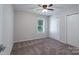 Neutral bedroom features plush carpet, a window and closet space at 1782 Oakdale Rd, Rock Hill, SC 29730