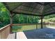 Covered gazebo on wooden deck overlooking private backyard at 1782 Oakdale Rd, Rock Hill, SC 29730