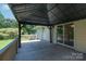 Spacious wooden deck with a covered gazebo, ideal for outdoor entertaining and relaxation at 1782 Oakdale Rd, Rock Hill, SC 29730