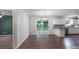 Dining area with access to a deck, adjacent to the updated kitchen with modern fixtures at 1782 Oakdale Rd, Rock Hill, SC 29730