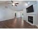 Open-concept living room with a fireplace, new flooring, and spacious layout at 1782 Oakdale Rd, Rock Hill, SC 29730