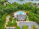 Aerial view of community pool, clubhouse, and meticulously maintained green spaces at 2010 Brightflower Ln, York, SC 29745