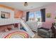 Bright bedroom with a cute bunk bed with slide and ample natural light at 210 Clove Hitch Dr, Statesville, NC 28677