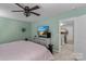 Comfortable main bedroom with stylish furniture and attached bonus area at 210 Clove Hitch Dr, Statesville, NC 28677