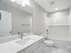 Bathroom with white vanity, mirror, and bathtub/shower combination at 2732 Mayfair Ave, Charlotte, NC 28208