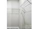 Walk-in closet features white wire shelving, offering ample storage space at 2732 Mayfair Ave, Charlotte, NC 28208