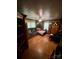 Cozy living room featuring laminate floors, comfortable sofa, and plenty of natural light at 302 Margarette Ave, Belmont, NC 28012