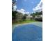 Large backyard with lush green grass, a privacy fence, and a playset area at 3022 Hendricks Chapel Ln, Charlotte, NC 28216