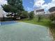 Backyard showcasing a mix of green spaces, plants and a shed at 3022 Hendricks Chapel Ln, Charlotte, NC 28216