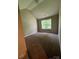 Bedroom featuring carpeted floors, one window offering natural light, and neutral walls at 3022 Hendricks Chapel Ln, Charlotte, NC 28216