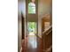 Welcoming foyer with high ceilings, hardwood floors, and natural light at 3022 Hendricks Chapel Ln, Charlotte, NC 28216