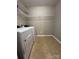 Laundry room with tile floors and washer and dryer at 3022 Hendricks Chapel Ln, Charlotte, NC 28216