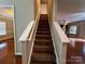 Carpeted stairway leading to the second floor of the home at 3022 Hendricks Chapel Ln, Charlotte, NC 28216