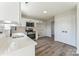 Modern kitchen featuring stainless appliances, white cabinets, gray floors and plenty of counter space at 3702 Arthur St, Indian Trail, NC 28079