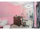Bathroom featuring light tile flooring, wood vanity, and silver hardware at 4124 Oakwood Rd, Charlotte, NC 28269