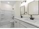 Bathroom featuring a double vanity with a shower and tub combo at 5328 Oaktree Dr, Gastonia, NC 28052