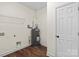 The utility room has a water heater and washer dryer hook-ups at 5328 Oaktree Dr, Gastonia, NC 28052