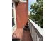 Charming balcony with a brick facade and wooden flooring, offering a scenic outdoor view at 6112 Creft Cir, Indian Trail, NC 28079
