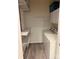Well-organized laundry room with shelving and modern washer and dryer at 6112 Creft Cir, Indian Trail, NC 28079