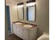 Bathroom with double vanity, modern fixtures, and updated countertop at 6218 Old Pageland Marshville Rd, Marshville, NC 28103