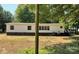 Backyard exterior view of home with rear deck at 6218 Old Pageland Marshville Rd, Marshville, NC 28103