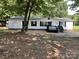 Charming single-story home with black shutters, front porch, and well-maintained landscaping at 6218 Old Pageland Marshville Rd, Marshville, NC 28103