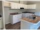Spacious kitchen boasting modern appliances, wooden countertops, and ample cabinet space at 6218 Old Pageland Marshville Rd, Marshville, NC 28103