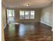 Bright and airy living room featuring sleek floors, natural light, and a welcoming atmosphere at 6218 Old Pageland Marshville Rd, Marshville, NC 28103
