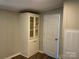 Room with built-in cabinet and vinyl flooring at 6218 Old Pageland Marshville Rd, Marshville, NC 28103