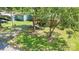 Quaint home with mature trees and a well-maintained front yard, offering a warm and inviting curb appeal in a serene neighborhood at 6616 Woodlawn Ln, Indian Trail, NC 28079
