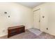 Small living room showcasing storage cabinet with carpet floors and painted walls at 6616 Woodlawn Ln, Indian Trail, NC 28079