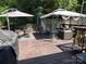 Spacious deck with a gazebo, seating and grill, perfect for outdoor entertainment and relaxation at 707 Regency Dr, Charlotte, NC 28211
