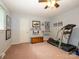 Bedroom featuring a treadmill, carpet flooring, and good natural light at 1047 Honeybee Trl, Fort Mill, SC 29715