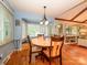Eat-in kitchen features a built-in seating area and natural light from the large window at 1047 Honeybee Trl, Fort Mill, SC 29715