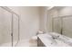 Modern bathroom featuring a tiled shower, vanity with sink, toilet, and large mirror at 11017 Warfield Ave # 4, Huntersville, NC 28078