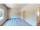 Inviting bedroom with plush carpet, natural light, and access to a full bath at 11017 Warfield Ave # 4, Huntersville, NC 28078