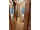 Bedroom with mirrored closet doors and neutral carpet at 111/113 Shawnee Trl # D140/141, Mount Gilead, NC 27306