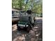The golf cart is parked in the yard at 111/113 Shawnee Trl # D140/141, Mount Gilead, NC 27306