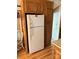Kitchen contains full size fridge, and wood cabinets at 111/113 Shawnee Trl # D140/141, Mount Gilead, NC 27306