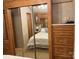 Main bedroom with mirrored closet doors and attached storage at 111/113 Shawnee Trl # D140/141, Mount Gilead, NC 27306