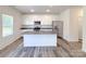 Kitchen with a center island, stainless steel appliances, and ample counter space at 1542 Antioch Dr, Conover, NC 28613