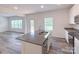 Kitchen featuring a large island and stainless steel appliances in an open-concept layout at 1542 Antioch Dr, Conover, NC 28613