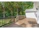 Spacious deck with wood railing overlooks lush greenery, ideal for outdoor entertaining at 1774 Timmons Marie Ln, Lincolnton, NC 28092